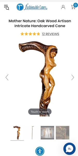 Cane with a naked woman carved into it. Her legs are strangely shaped.