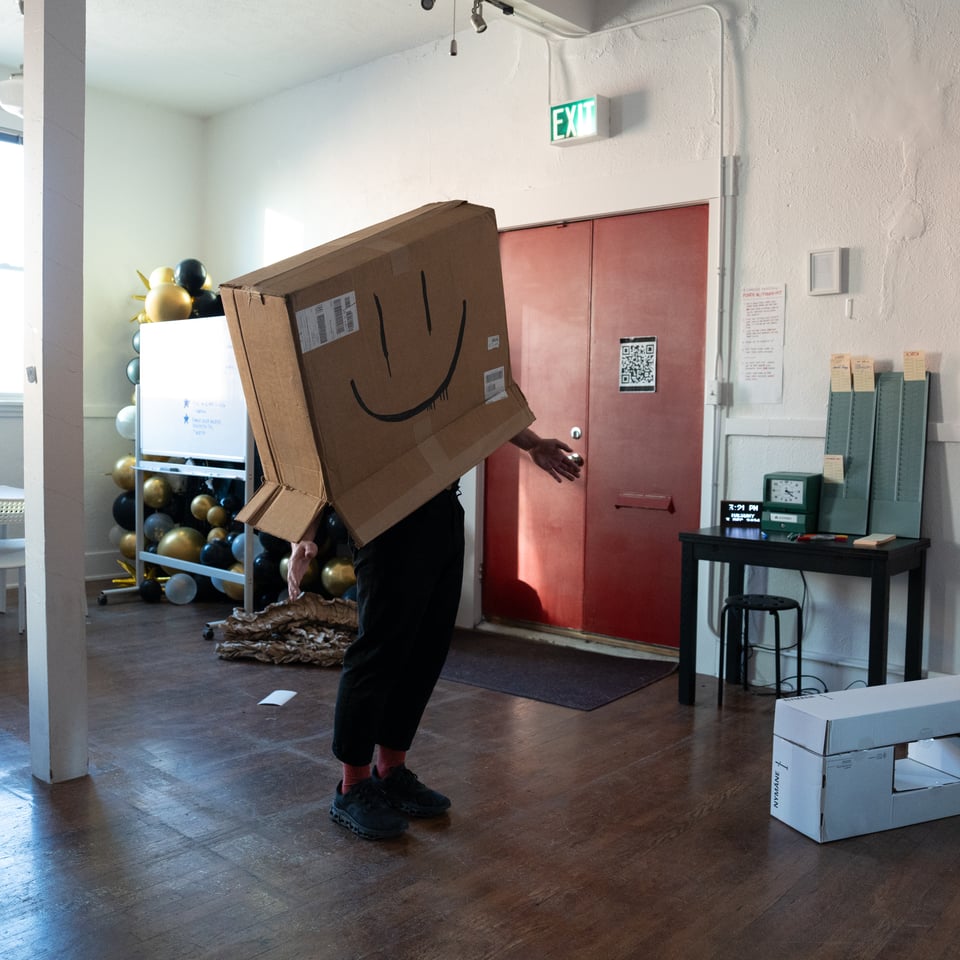 Dan wearing a box mask.