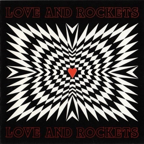 This one is hard for me to describe. Imagine a chessboard, only warp it so that the squares are more like diamonds, pointing towards the center. Four of the black squares, in the "north," "south," "east" and "west" positions have been warmped into arrows, also pointing towards the center. In the center is a red heart. It's a little more intricate than that but that's the best I can do.