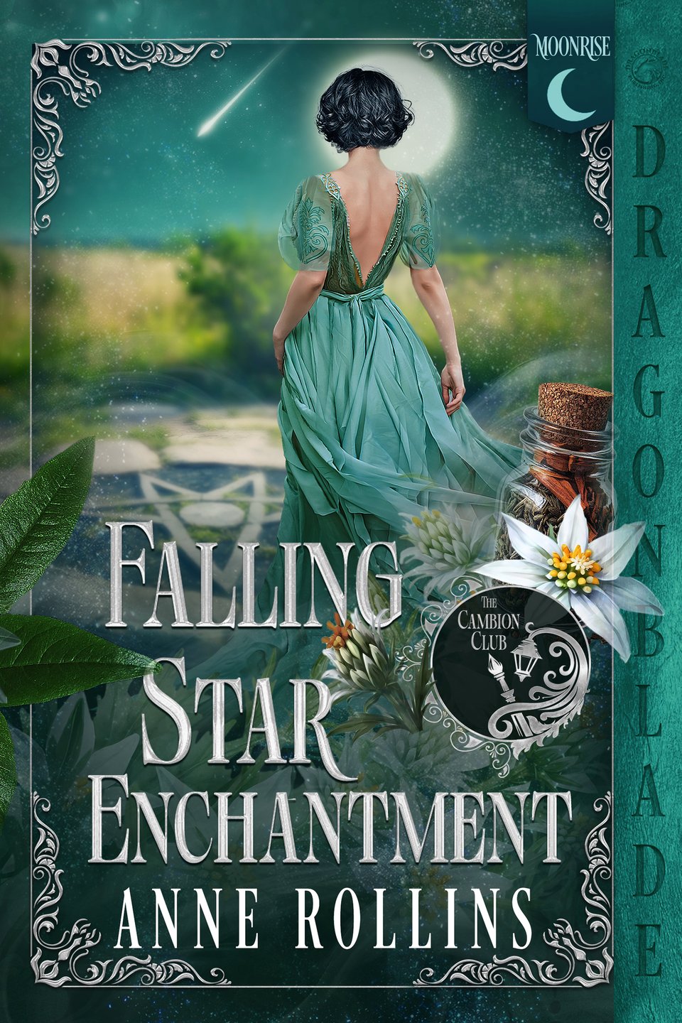 Green book cover for "Falling Star Enchantment" by author "Anne Rollins." The cover depicts a white woman facing away from the viewer, staring at a full moon and a shooting star streaking across the night sky. The woman wears a green dress and has dark, curly hair, cut in a bob. On the right hand side of the cover, in the foreground, there is a glass apothecary bottle, a white flower, and the logo for the “Cambion Club” series of Gaslamp fantasies. The cover art is framed by a vintage-looking silver filigree border. On the right-hand margin is a vertical box that reads “Dragonblade.”