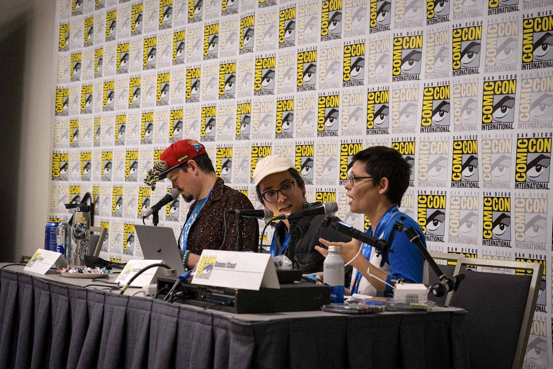 A photograph of the three of us on the stage.
