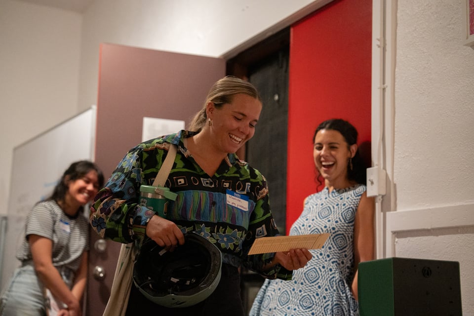 Madison smiling after punching out.