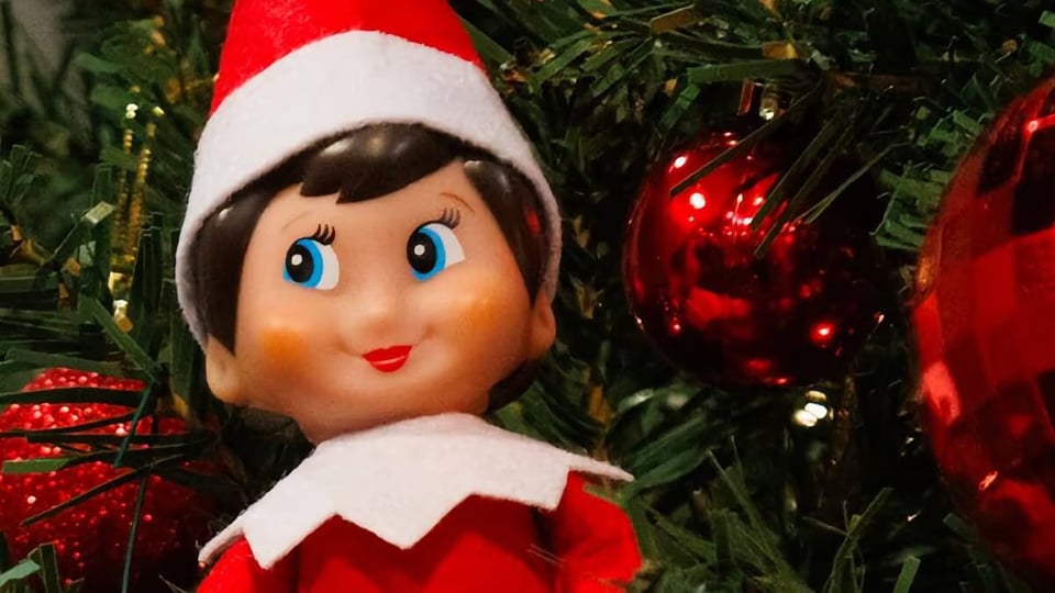elf on the shelf looking to the side