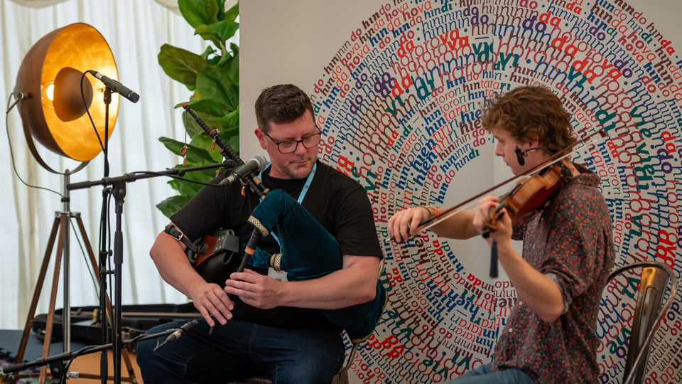 Donald WG Lindsay and Roo Geddes playing together at Piping Live!