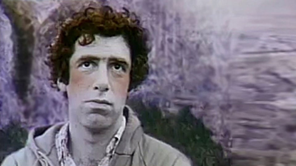 a man with curly hair