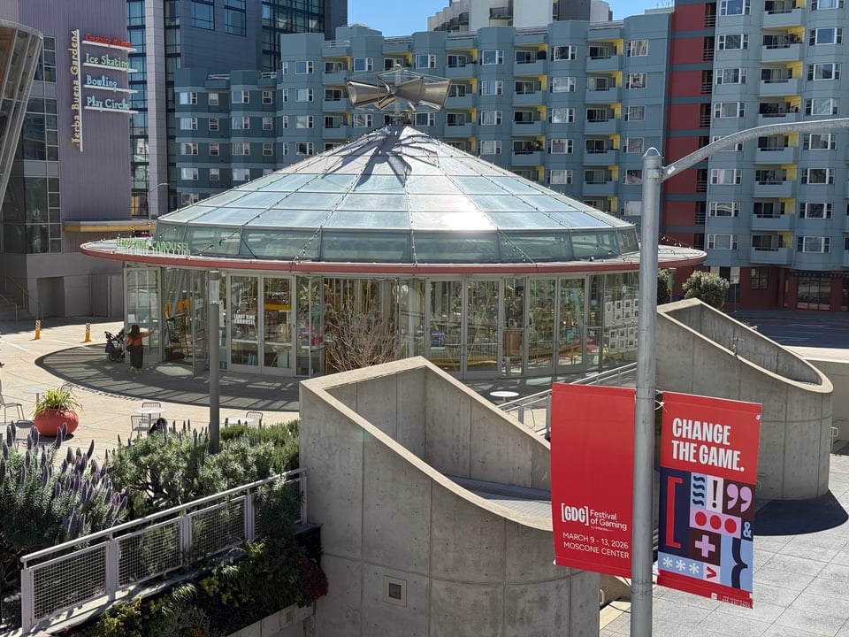 The LeRoy King Carosuel during the daytime, with GDC banners in the foreground.
