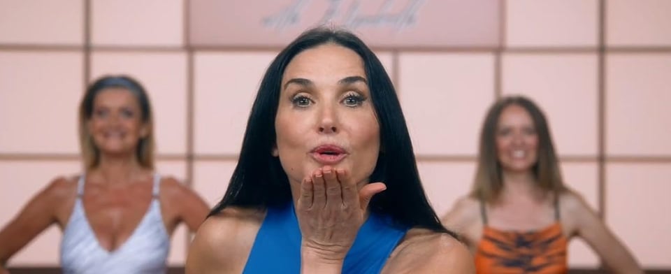 Elisabeth Sparkle (Demi Moore) blows a kiss to the camera.
