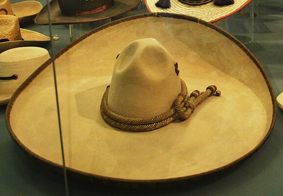 A broad brimmed, Mexican style tan hat.
