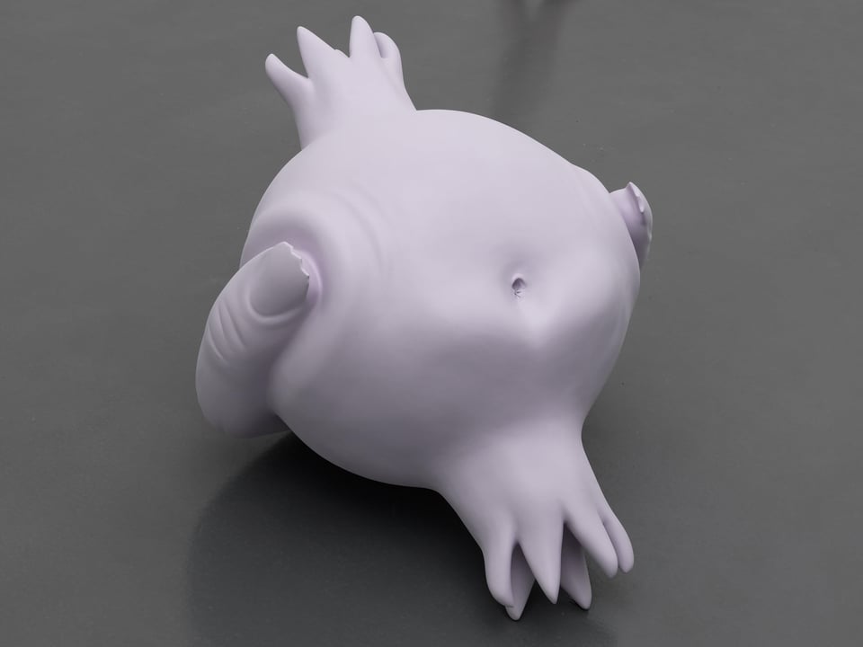 A lavender sculpture depicting fingers squeezing a pomegranate with a belly button.