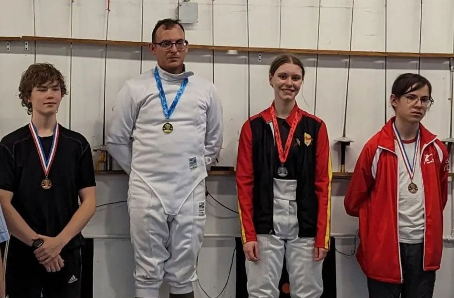 Lachlan Mudge, Joaquin Montoya, Kathryn Luminati, and Brady Lawrence on the medal stand.