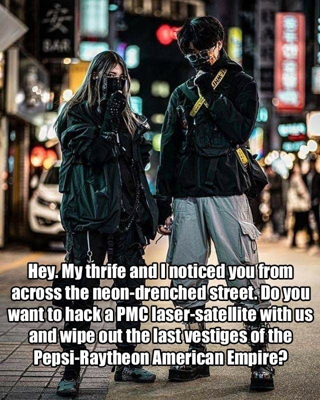 A photo from old old Tokyo of two people in pre-digvis streetech wear standing in the street, posing for the real, living, fleshy camera person. Overlaid text reads: Hey. My thrife and I noticed you from across the neon-drenched street. Do you want to hack a PMC laser-satellite with us and wipe out the last vestiges of the Pepsi-Raytheon American Empire?