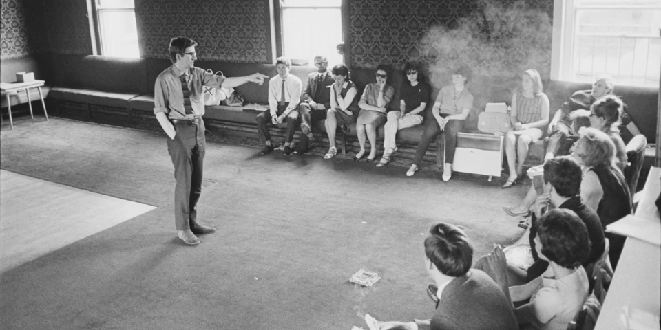 A young Keith Johnstone teaches at the Royal Court in this black and white photo.