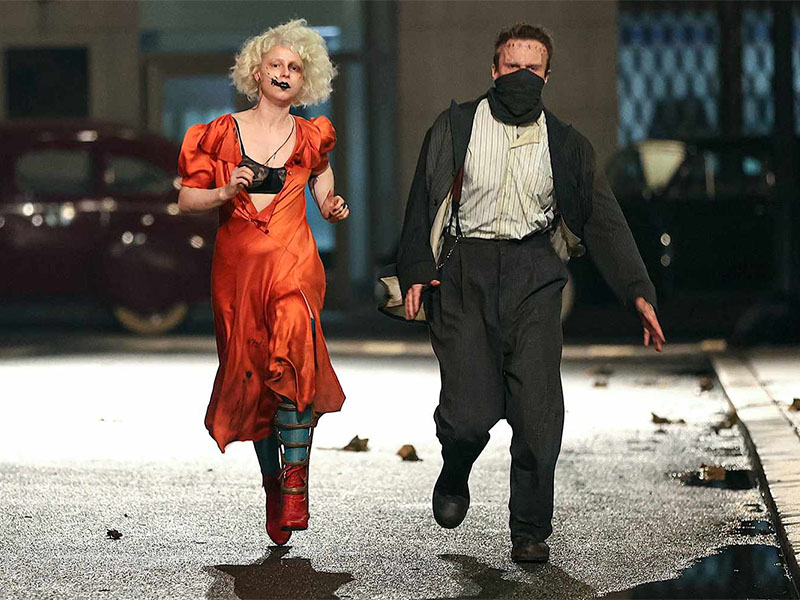 Ida and Frank running down a street