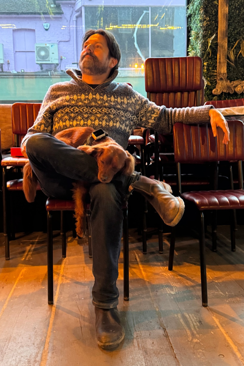 Radio dangles from Dylan’s lap.
