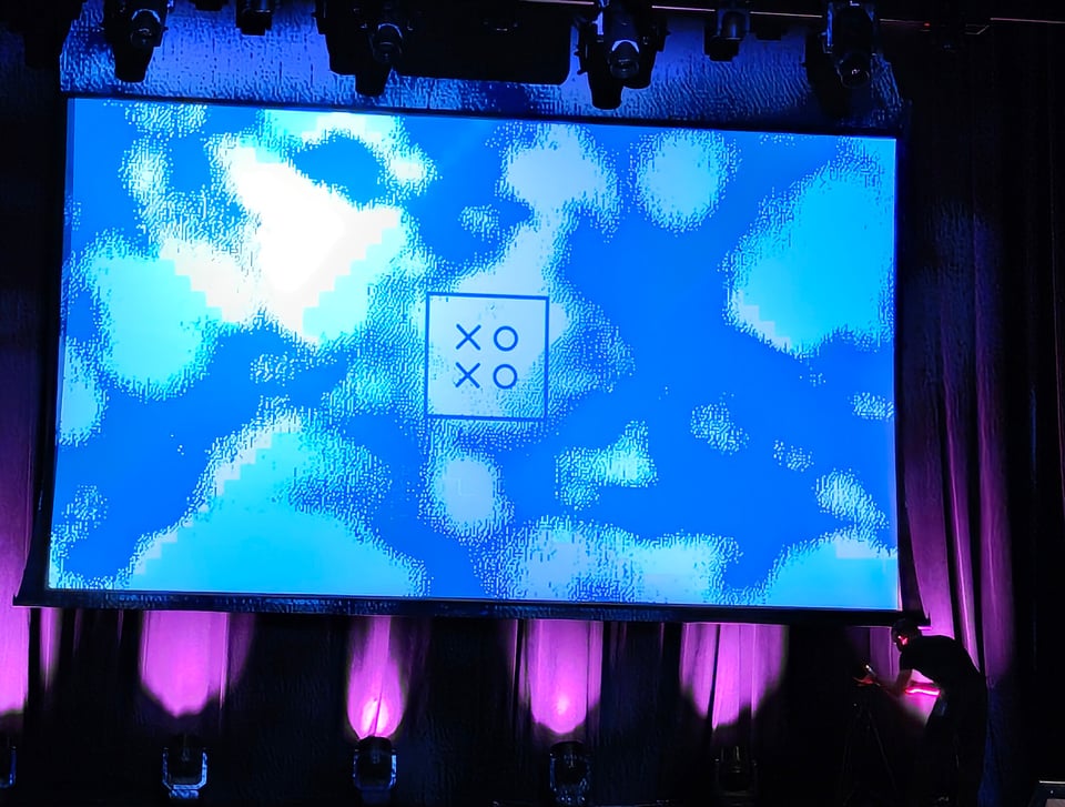 The stage of XOXO 2024, with nobody there. (Well there's a tech hand visible but like you can't really see them)