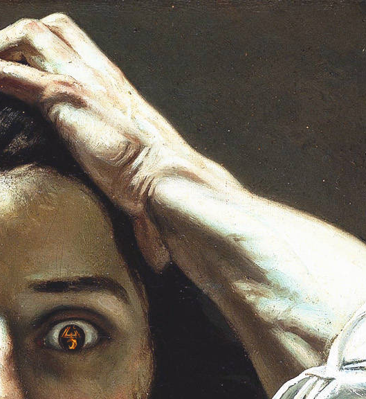 It's a picture of man with a strange yellow symbol in his eye, he looks distraught, his hand clutching his head