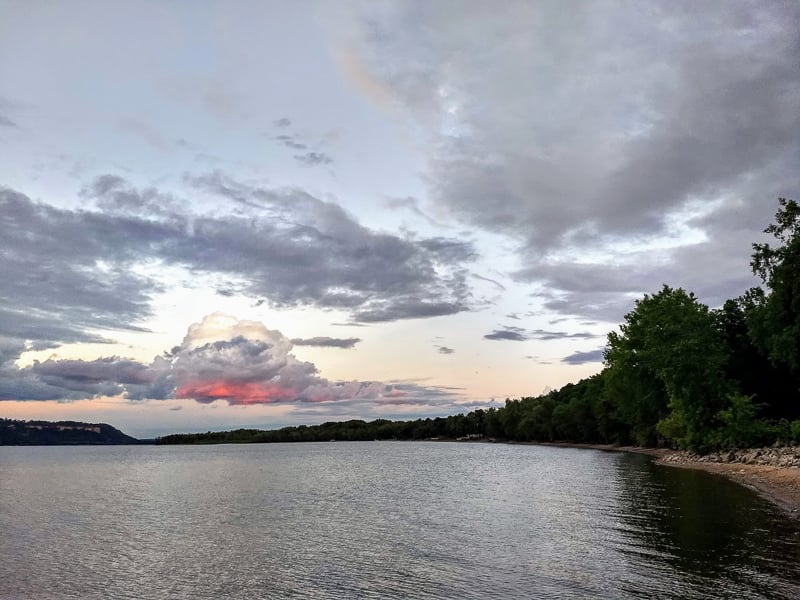 A spring sunrise on the Sand Point Trail beach. / Photo by Jake Gaster