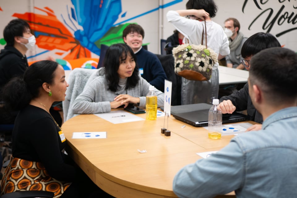 Image of people talking together from all different nationalities.