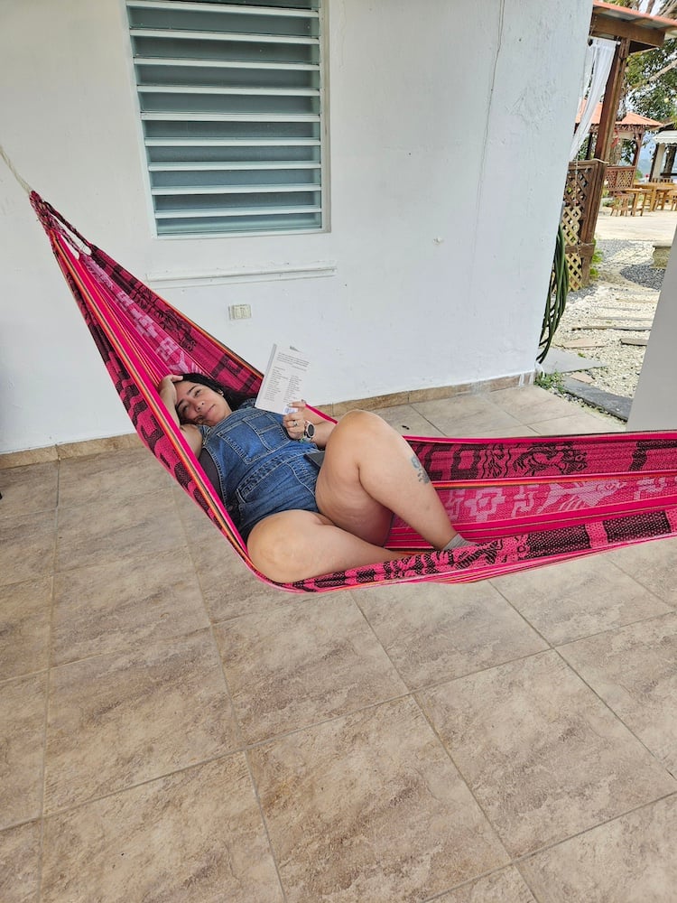 a woman relaxing in a hammock
