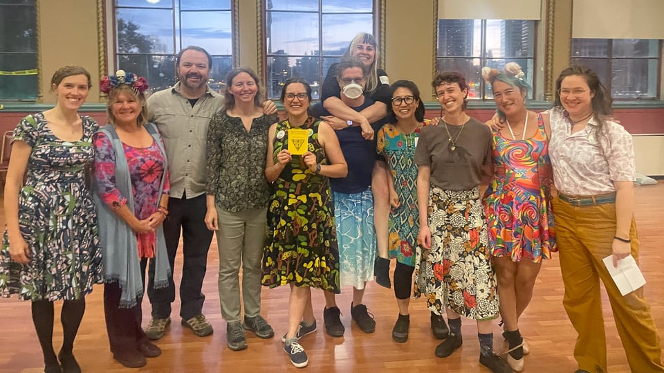 11 explorers, all in a row and about to dance Contra