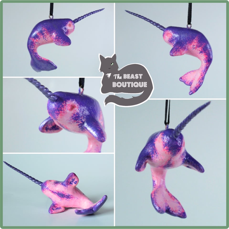 a collage showing a metallic purple narwhal figurine from multiple angles. The narwhal is counter-shaded, its belly a non-metallic bubblegum pink. Its horn is painted a matching metallic purple.

the shop logo, a one-eyed grey cat, and the words "the beast boutique" watermark the image.