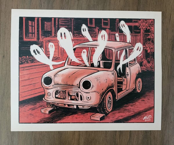 A digital illustration of an old hollowed-out car, an Austin Mini, parked in a dirt driveway, with several ghosts drifting out. A fence, some trees, and a house next door can be seen in the background. The colour palette is monochrome red.