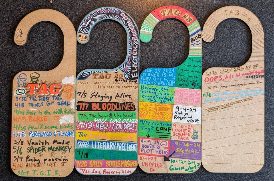 door hangers with stuff written on them