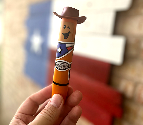 A Neuland BigOne marker dressed like a cowboy using stickers and a little plastic hat.