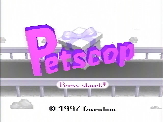The Petscop game menu and logo, with big cheerful pink text over a misty white background