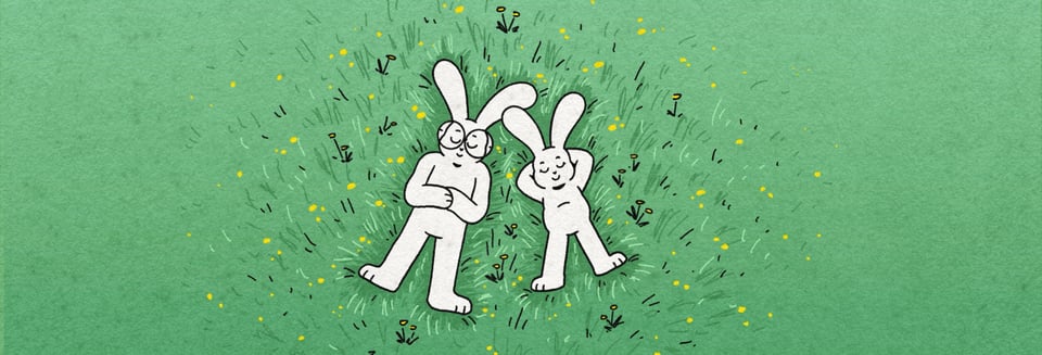 Two cartoon anthropomorphic rabbits lying in a green field, staring up at the sky.