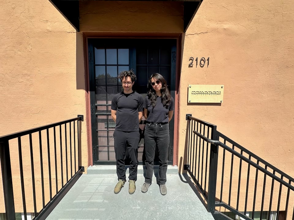 Ivan and Lexi wearing all black.
