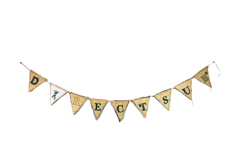 A yellow fabric triangle flag bunting style banner that reads DirectSub