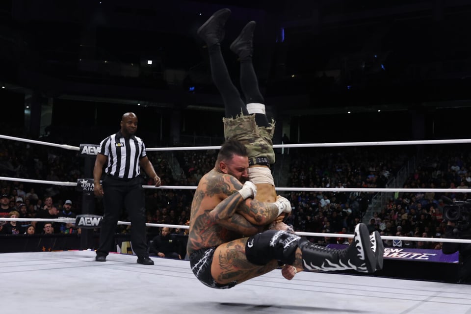 Brody King delivering a match-ending Gonzo Bomb to Darby Allin.