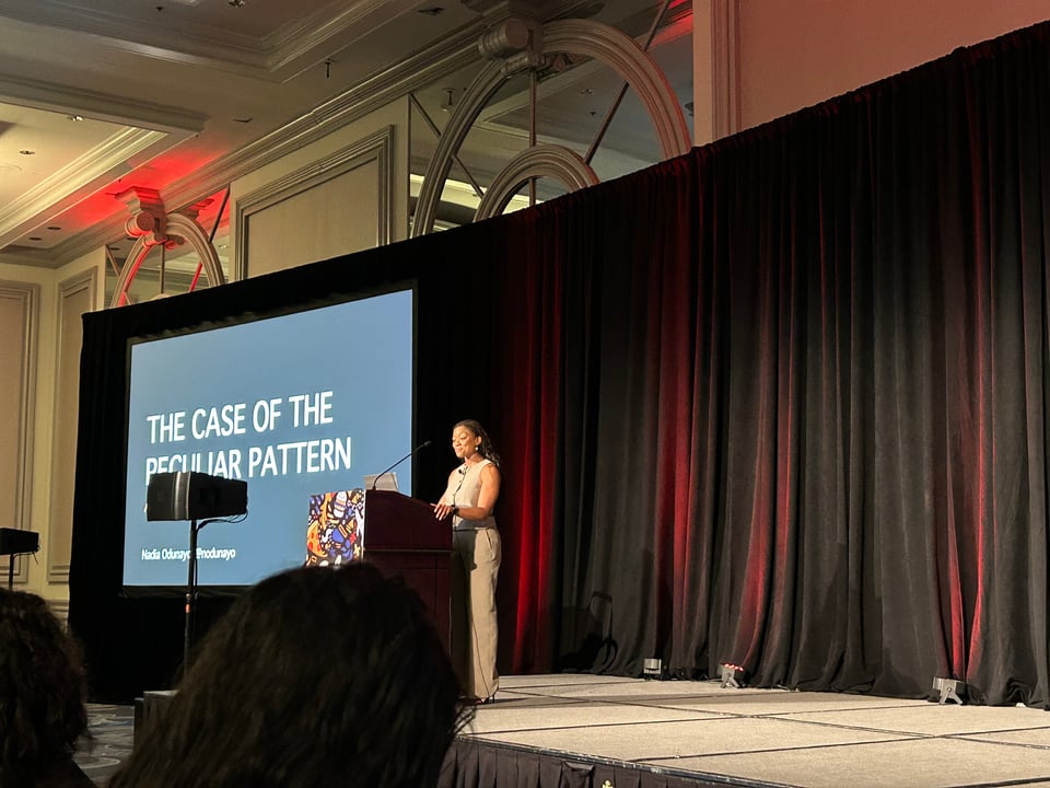 Photo of me at a podium on stage.