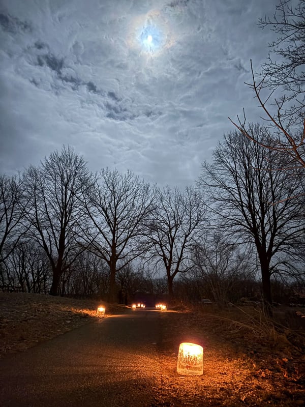 The nearly full moon made an appearance at our annual CandleNight in the park on Feb. 28. For the third year in a row, not much snow appeared. But lots of people showed up — a couple of hundred, at least. We so enjoyed chatting with those of you who stopped by the picnic shelter to say hi, and walking in the quiet, candlelit woods! / Photo by Brian Henkel