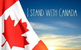 An image of the Canadian flag set against a backdrop of the sky, with the words "I stand with Canada".