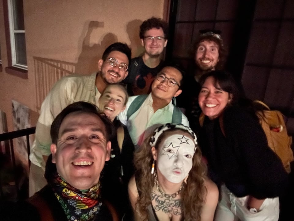 A selfie of people who have just done some amount of work.