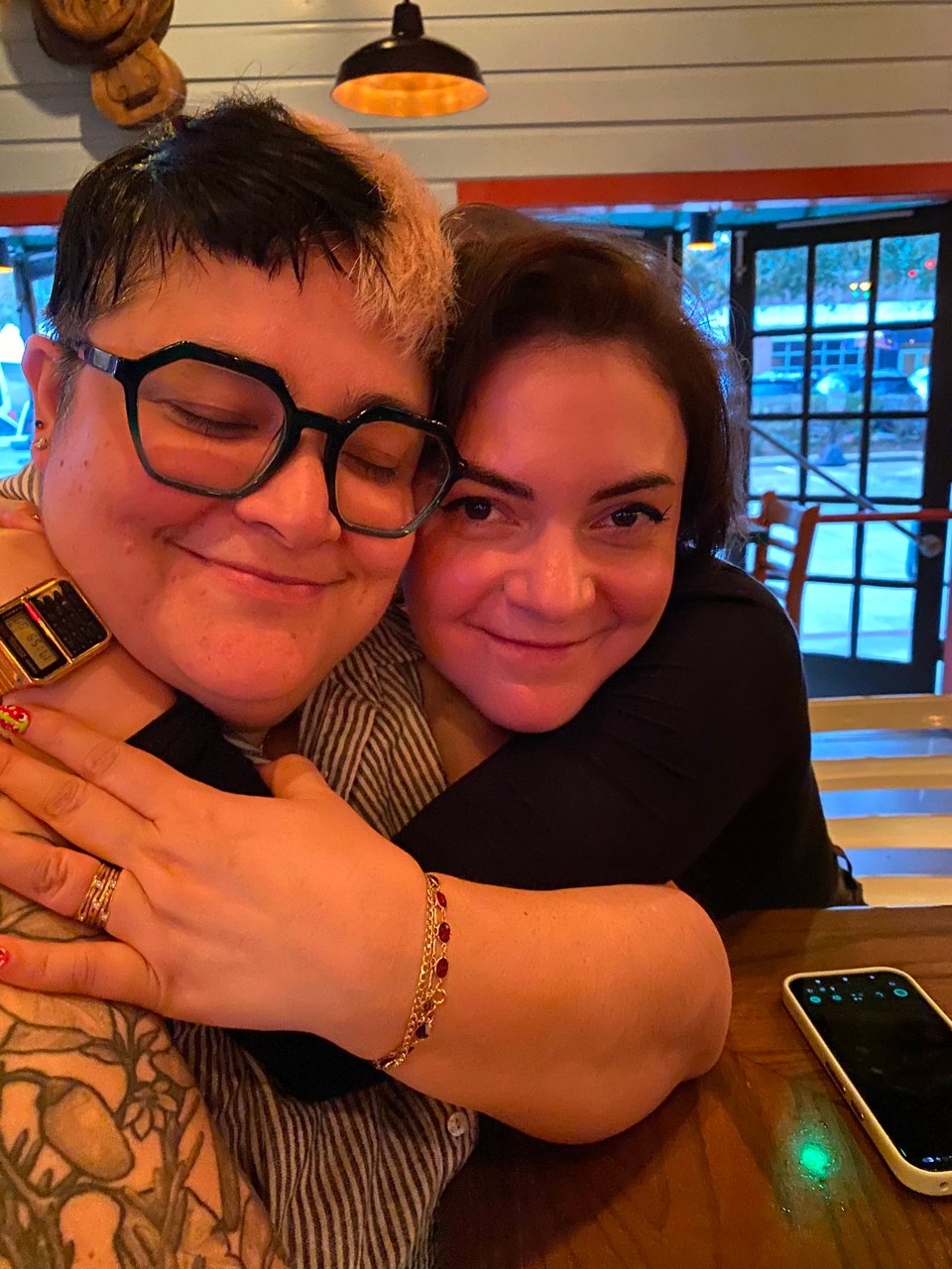 a picture of me being held by my youngest sister Kynsey