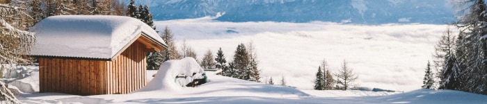 A wooden cabin in the snow