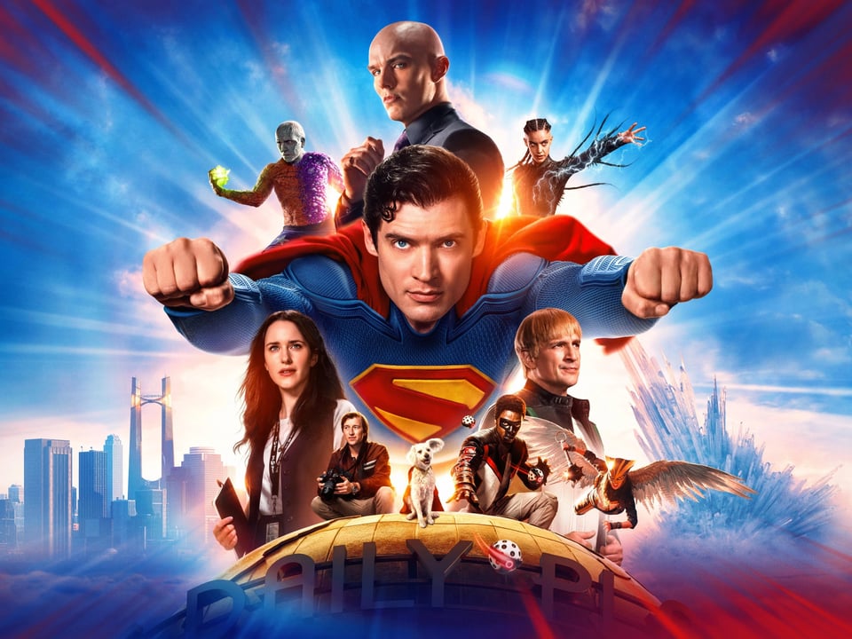 A poster for Superman, including (in clockwise order from the top) Lex Luthor, Metamorpho, Lois Lane, Jimmy Olsen, Krypto, Mr. Terrific, Hawkgirl, Green Lantern (Guy Gardner), and The Engineer, all atop the Daily Planet globe and against a backdrop of Metropolis and the Fortress of Solitude.