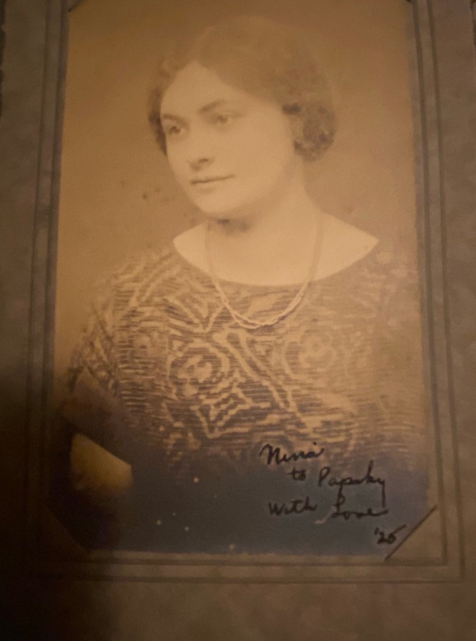sepia-toned image of teenage girl from 1925