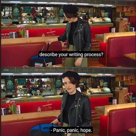 Phoebe Waller-Bridge being asked to describe her writing process and answering, "panic, panic, hope" while looking dashing in a dark beret-like hat with a colourful diner background.