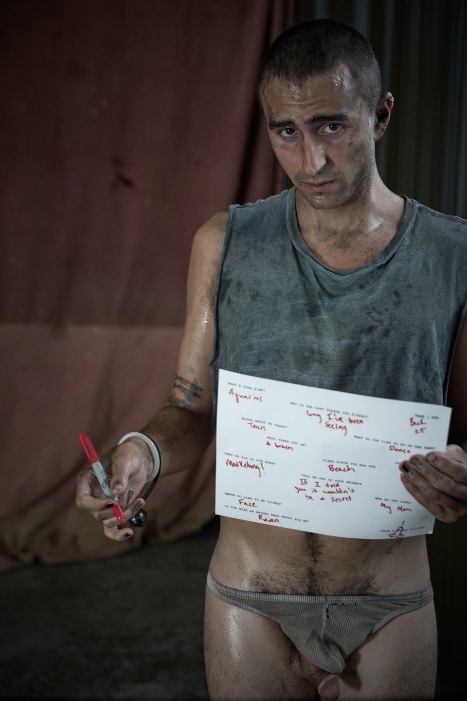 beck holds his filled out questionaire