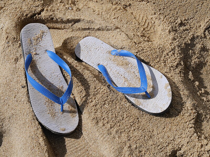 A pair of flip flops in the sand. It will make more sense as you keep reading. Trust the process.