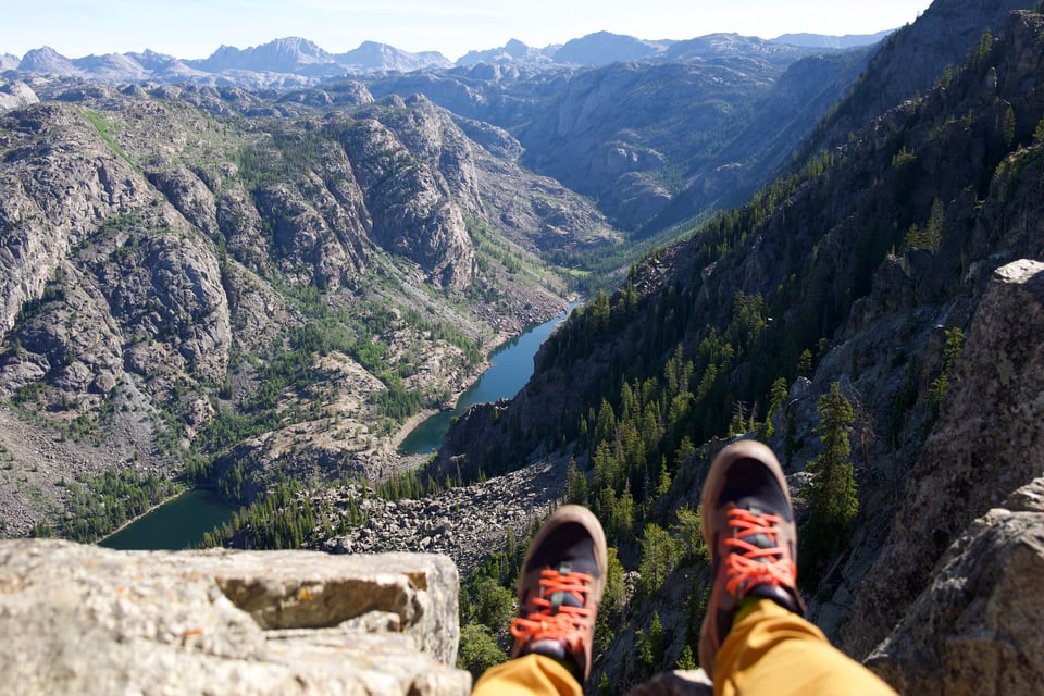 Feet on a mountain