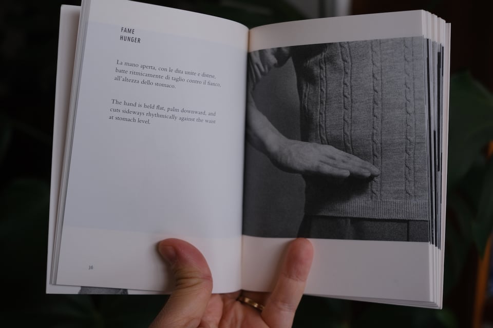 The gesture for "Hunger," from Bruno Munari’s Speak Italian: The Fine Art of the Gesture