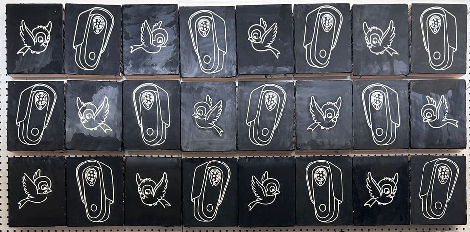 24 8x10 panels, painted black, with white line paintings of flock cameras and birds.