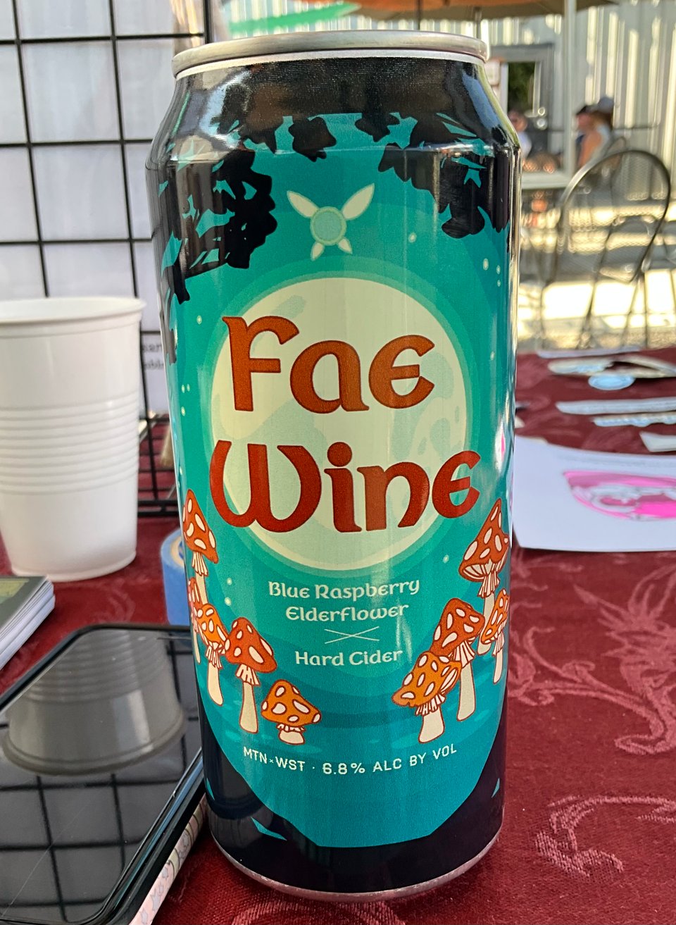 A photograph of a canned cider called "Fae Wine" by MTN West.