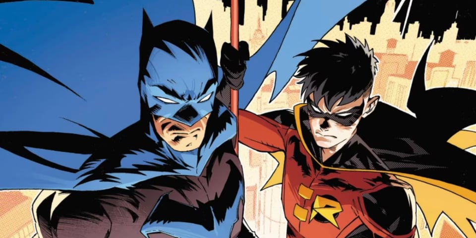 Batman & Robin look down on Gotham City.