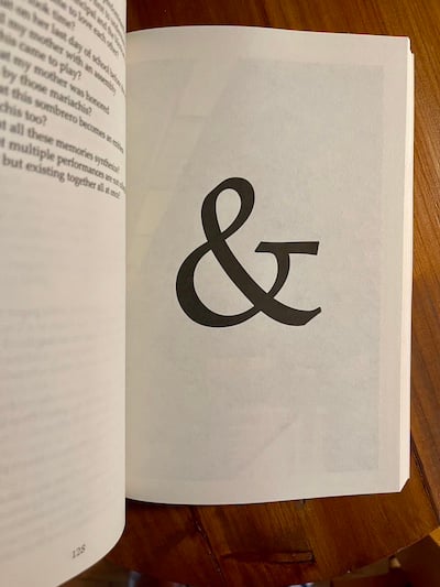 a page from Gabrielle Civil's book In & Out of Place, an enormous ampersand